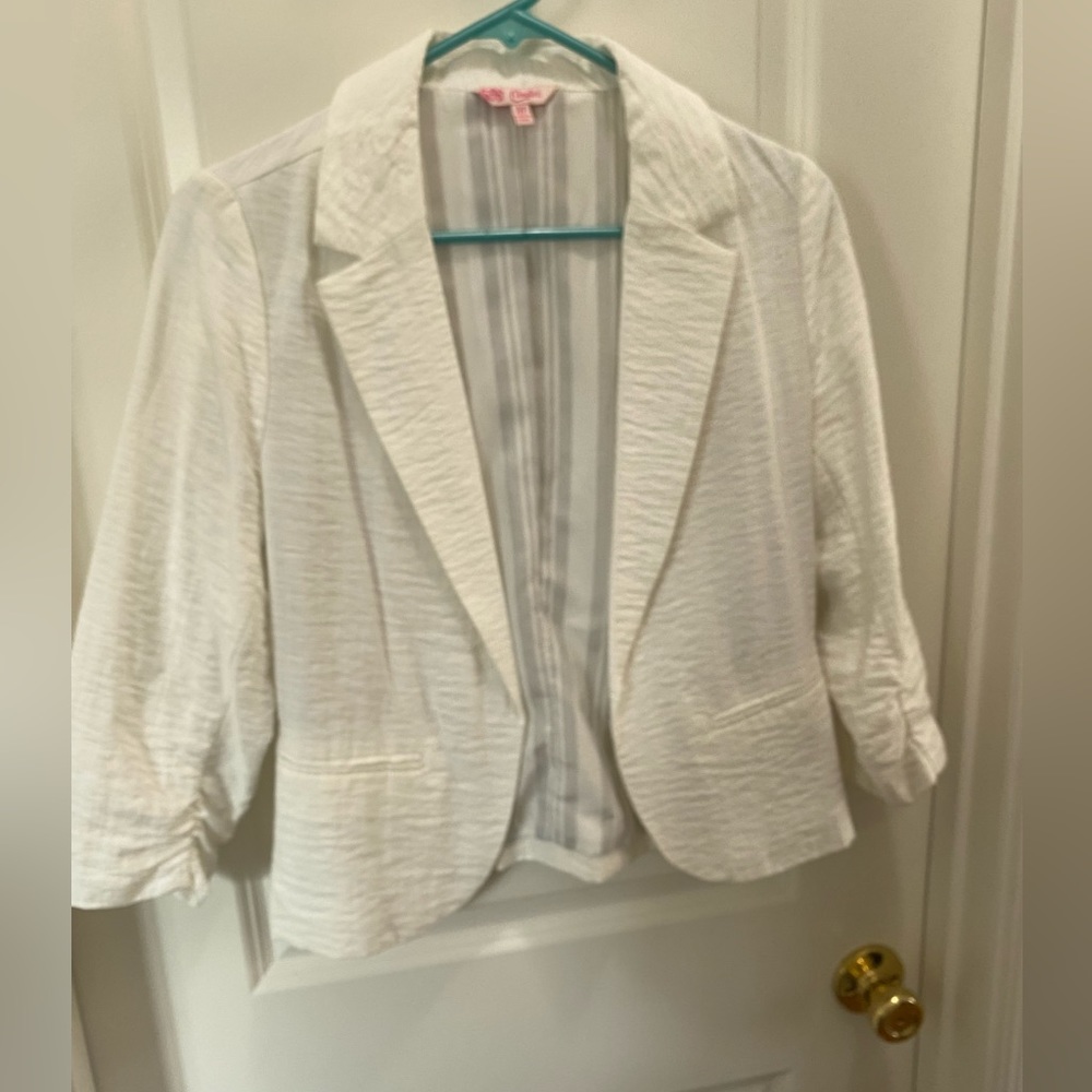 Candie’s ruched sleeve white blazer.